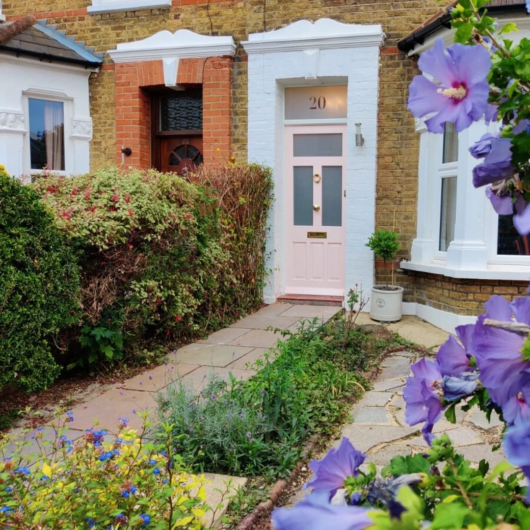 Timber front door and sash windows on a South London period home